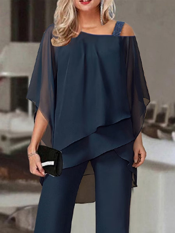 Navy blue two-piece set of gathered top and trousers with cold shoulders