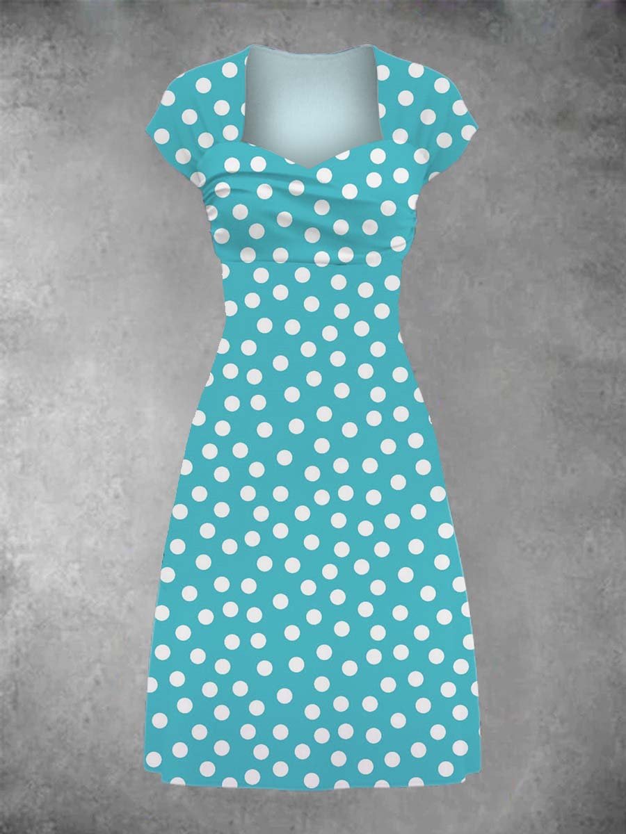 Casual midi dress in retro look with polka dots and patchwork