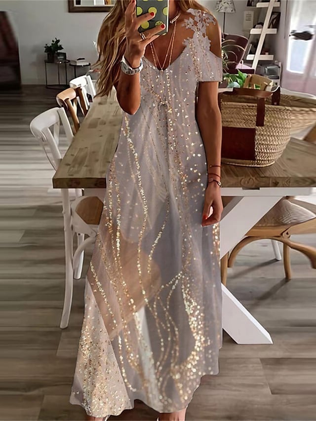 Maxi dress with glitter band and cold shoulders