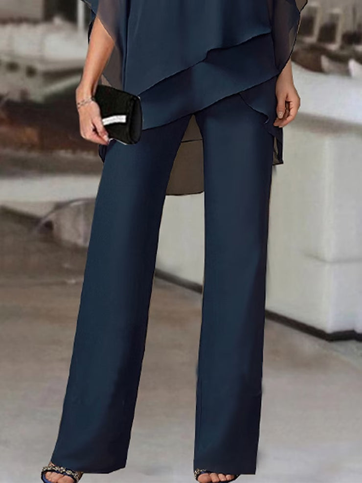 Navy blue two-piece set of gathered top and trousers with cold shoulders