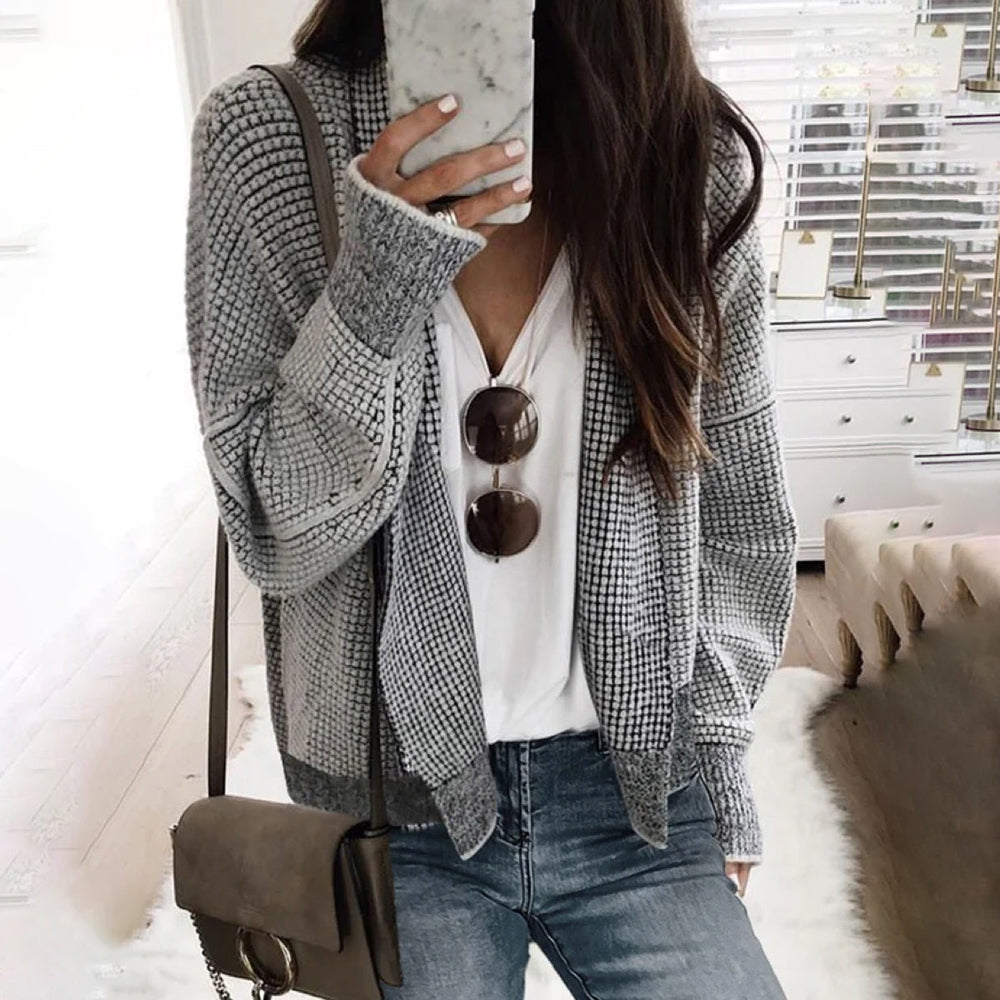 Grey solid color cardigan with long sleeves