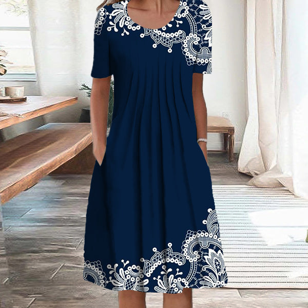 Midi dress with floral garden pattern in lace and blue shift