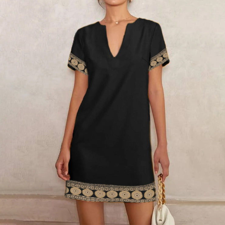 Trendy black mini dress with short sleeves