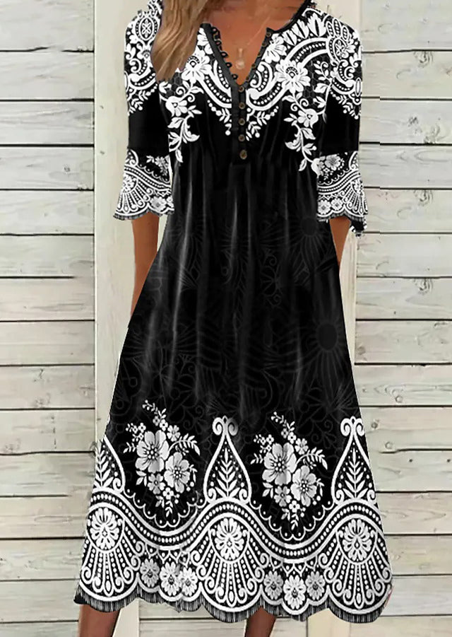 Trendy black midi dress with side pockets